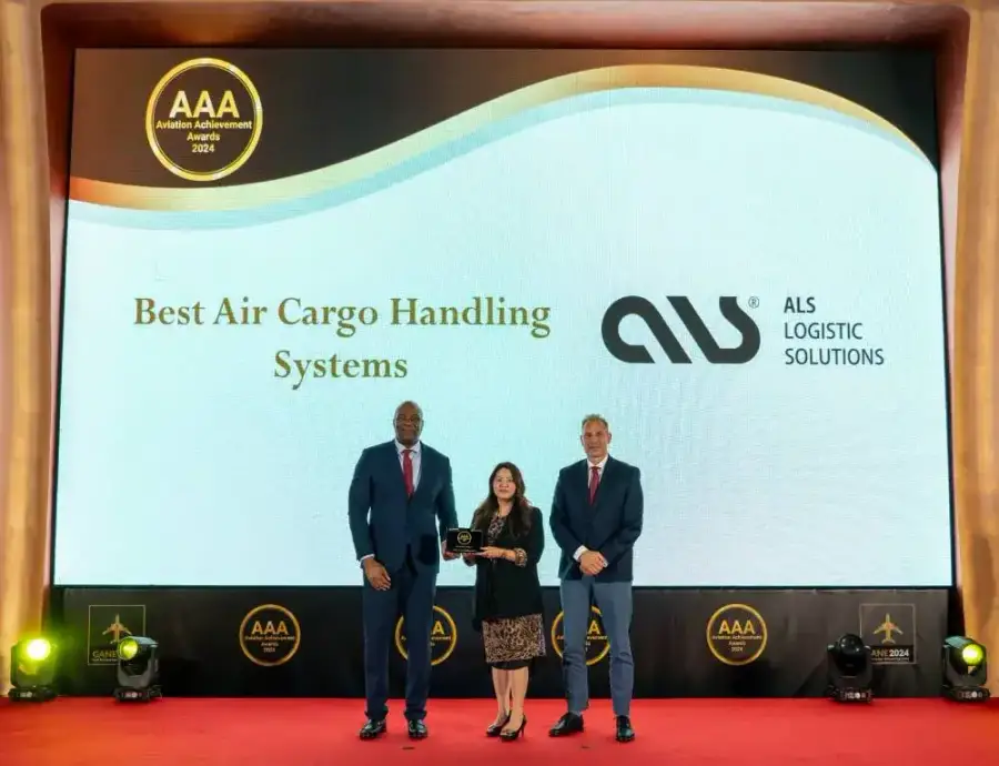 ALS team holding the Best Air Cargo Handling Systems plaque at the Aviation Achievement Awards 2024