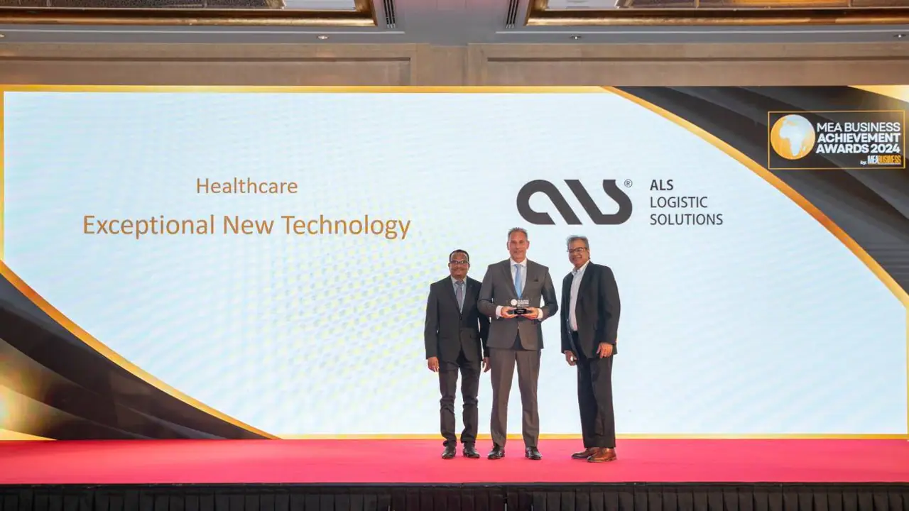ALS team holding the Healthcare Exceptional New Technology award at the MEA Business Achievement Awards 2024