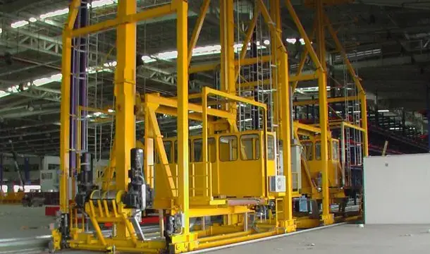 Yellow elevating transfer vehicles at Bangkok International Cargo Terminal, Suvarnabhumi Airport, Thailand